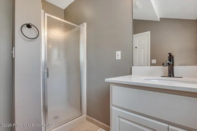 a view of a lake with houses in the back