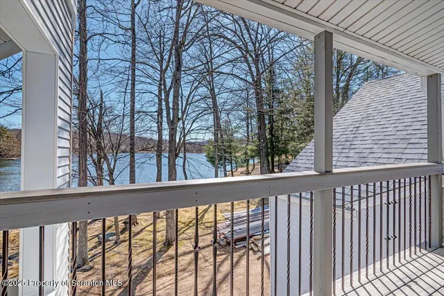 an aerial view of residential building and ocean