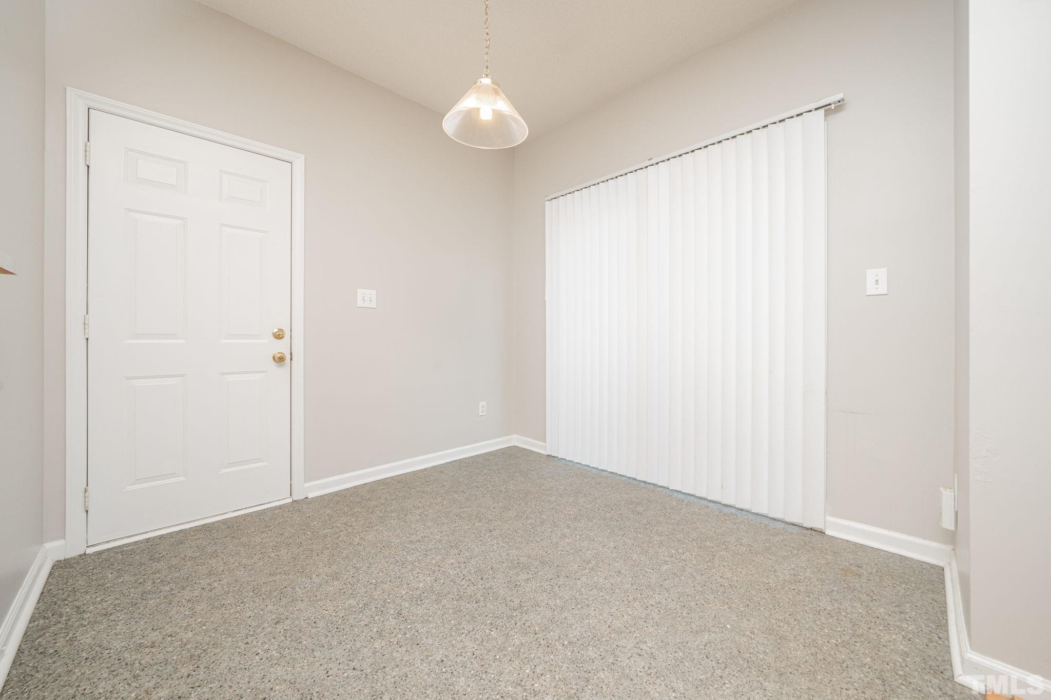 114 Calebra Way Cary, NC 27519 - Photo 15 of 50 an empty room with a empty space