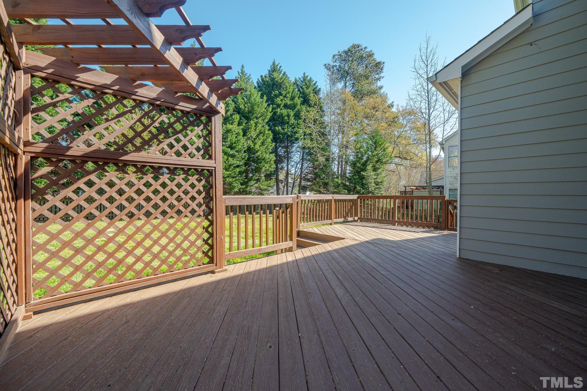 114 Calebra Way Cary, NC 27519 - Photo 40 of 50 a view of a balcony with wooden floor