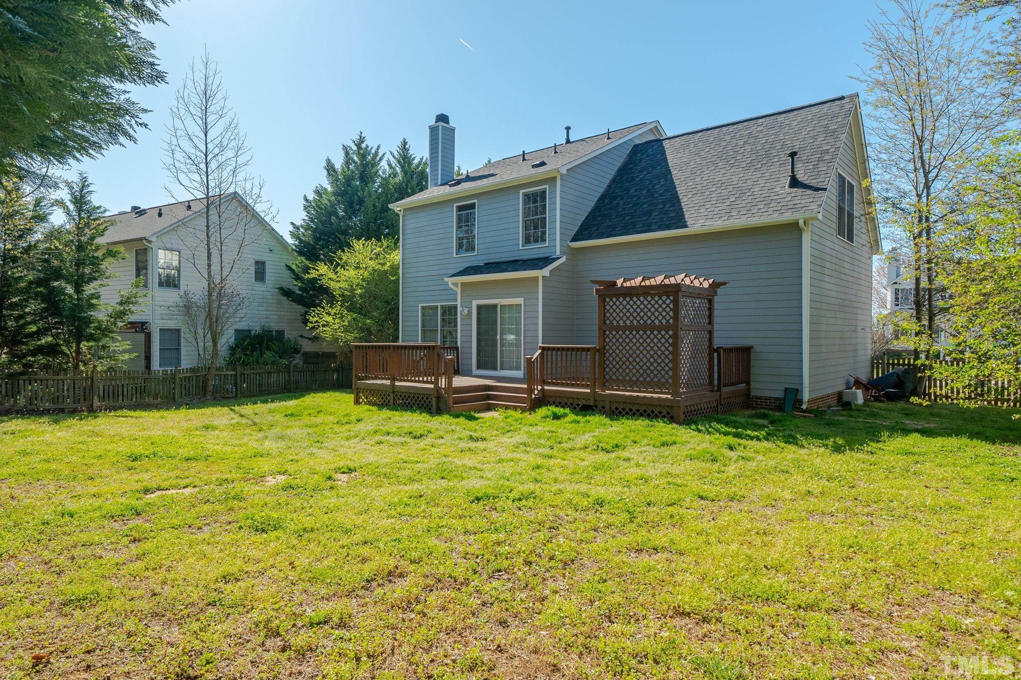 114 Calebra Way Cary, NC 27519 - Photo 45 of 50 a house with a yard