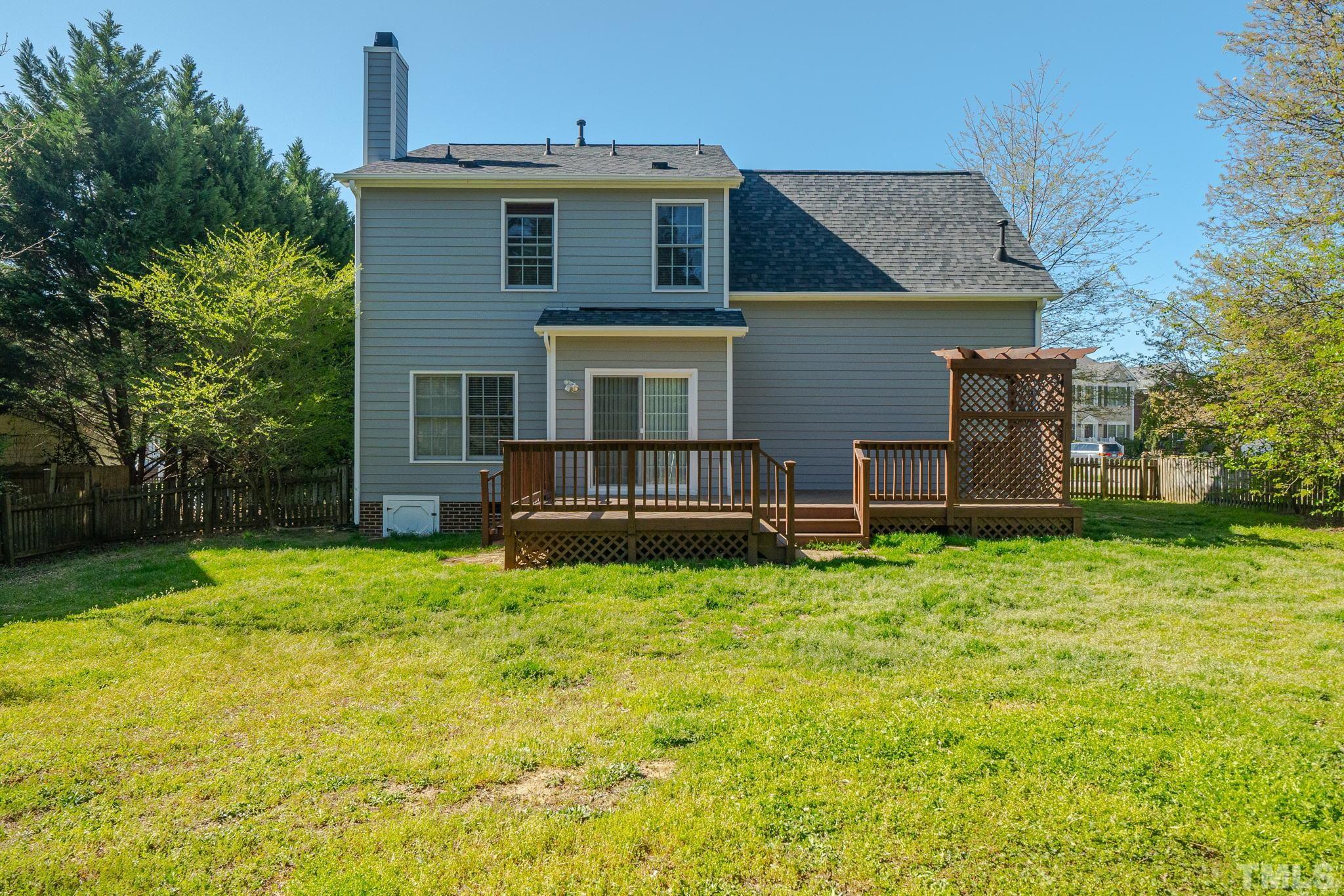 114 Calebra Way Cary, NC 27519 - Photo 46 of 50 a front view of a house with a yard