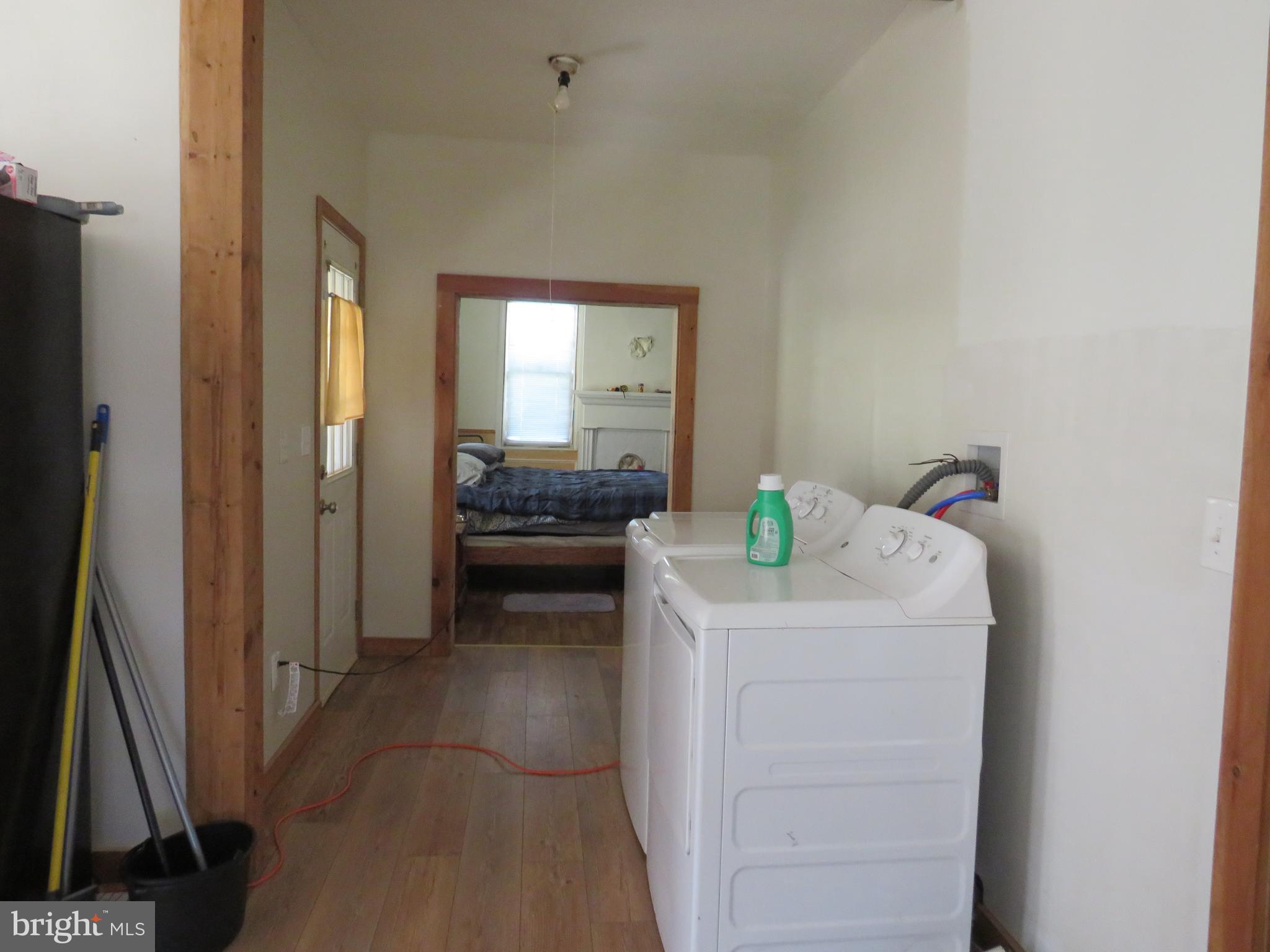 26955 Johnson Creek Road Crisfield, MD 21817 - Photo 12 of 35 a en suite bathroom with a sink and a mirror