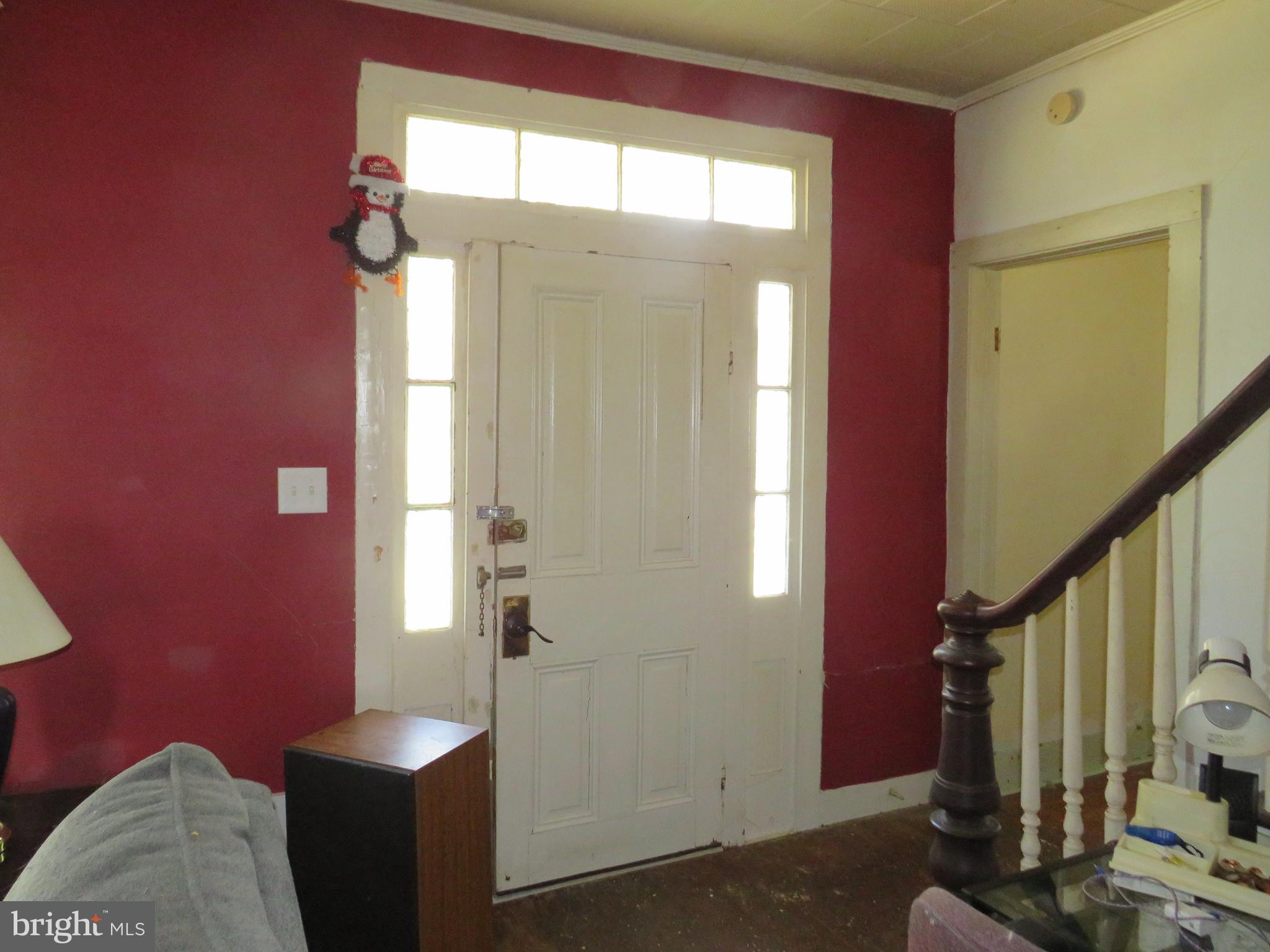 26955 Johnson Creek Road Crisfield, MD 21817 - Photo 19 of 35 a view of hallway with furniture and windows