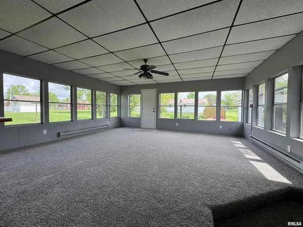 a view of an empty room with a sliding door