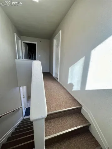 a view of furniture and wooden floor