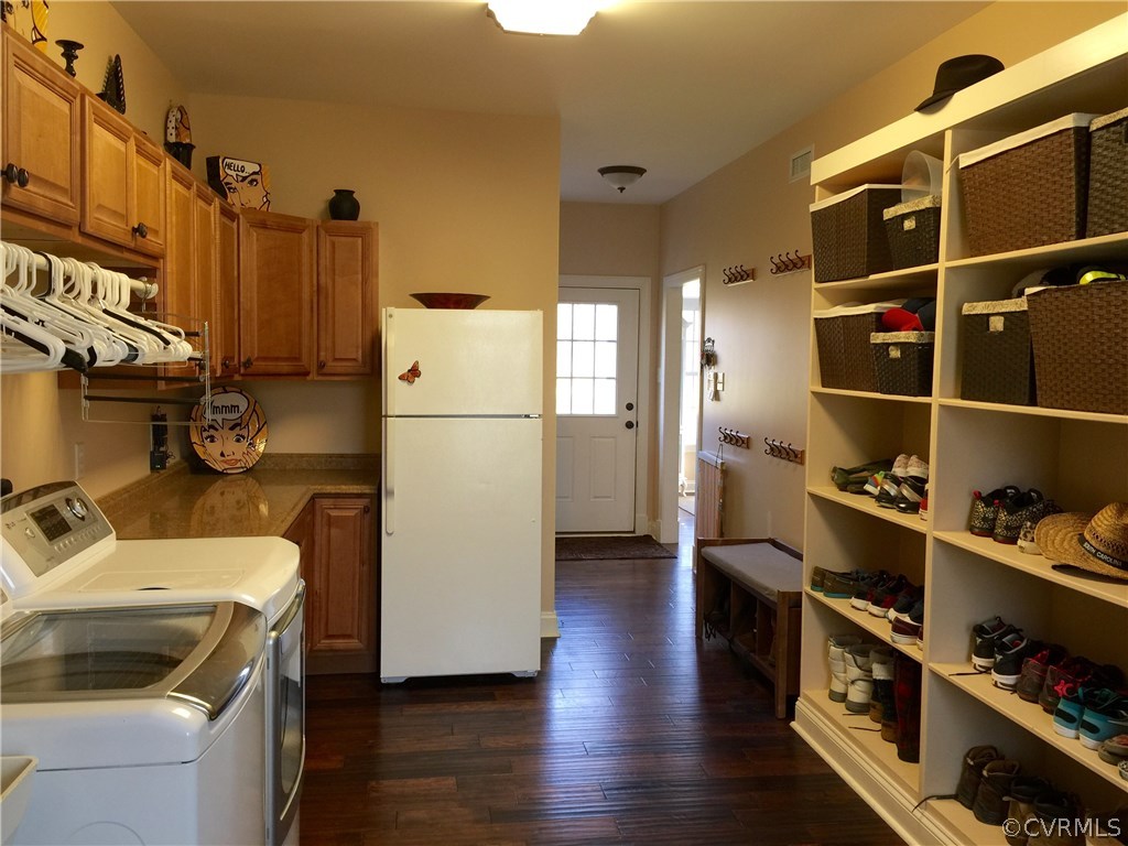 13700 River Road Chesterfield, VA 23838 - Photo 5 of 10 a room with a refrigerator and cabinets