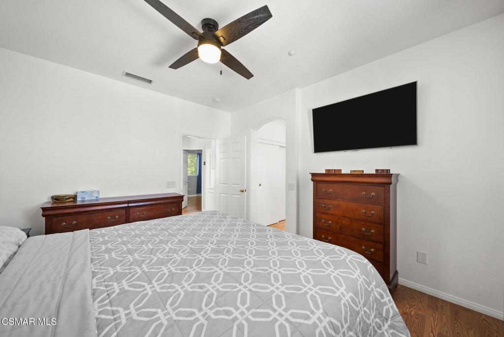 1838 Amberleaf Lane Simi Valley, CA 93065 - Photo 22 of 39 a bedroom with a bed and a flat screen tv