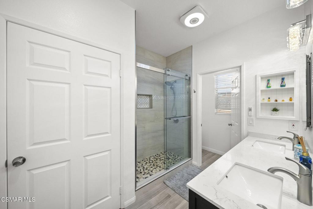 1838 Amberleaf Lane Simi Valley, CA 93065 - Photo 23 of 39 a bathroom with a sink and a shower