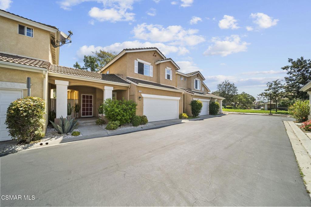 1838 Amberleaf Lane Simi Valley, CA 93065 - Photo 3 of 39 a view of a house with a street