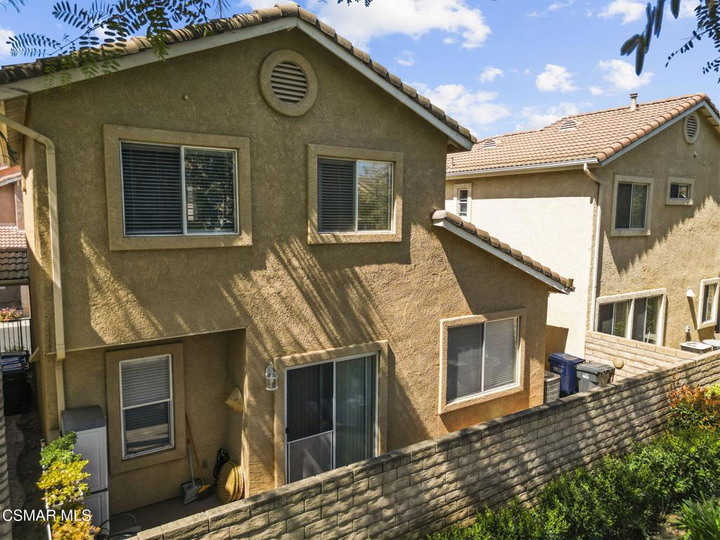 1838 Amberleaf Lane Simi Valley, CA 93065 - Photo 38 of 39 a front view of a house with a garage