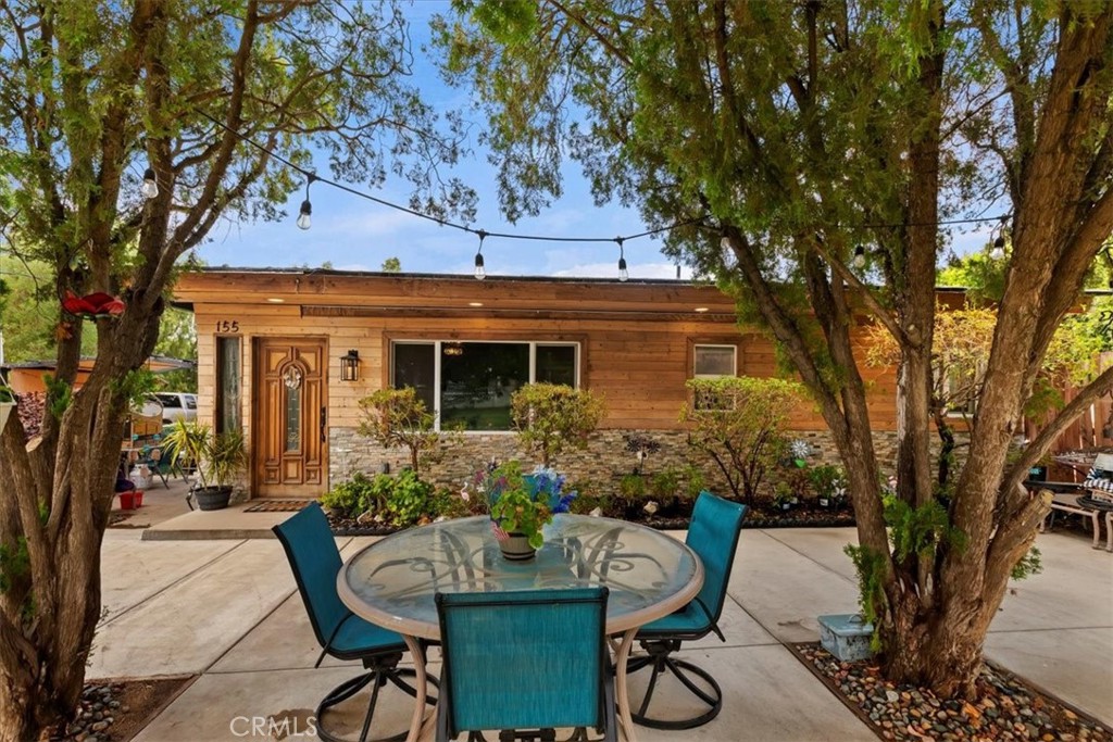 155 Sixth Street Norco, CA 92860 - Photo 1 of 1 a view of a patio with furniture and potted plants