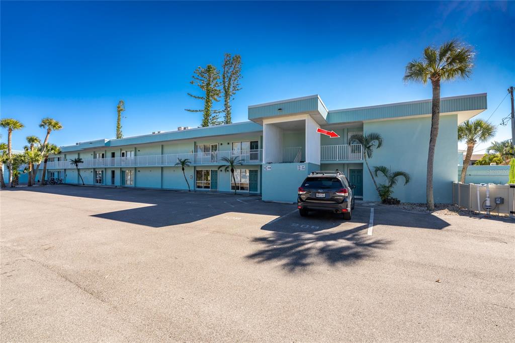 5055 North Beach Road, Unit 208 Englewood, FL 34223 - Photo 27 of 43 a car parked in front of house