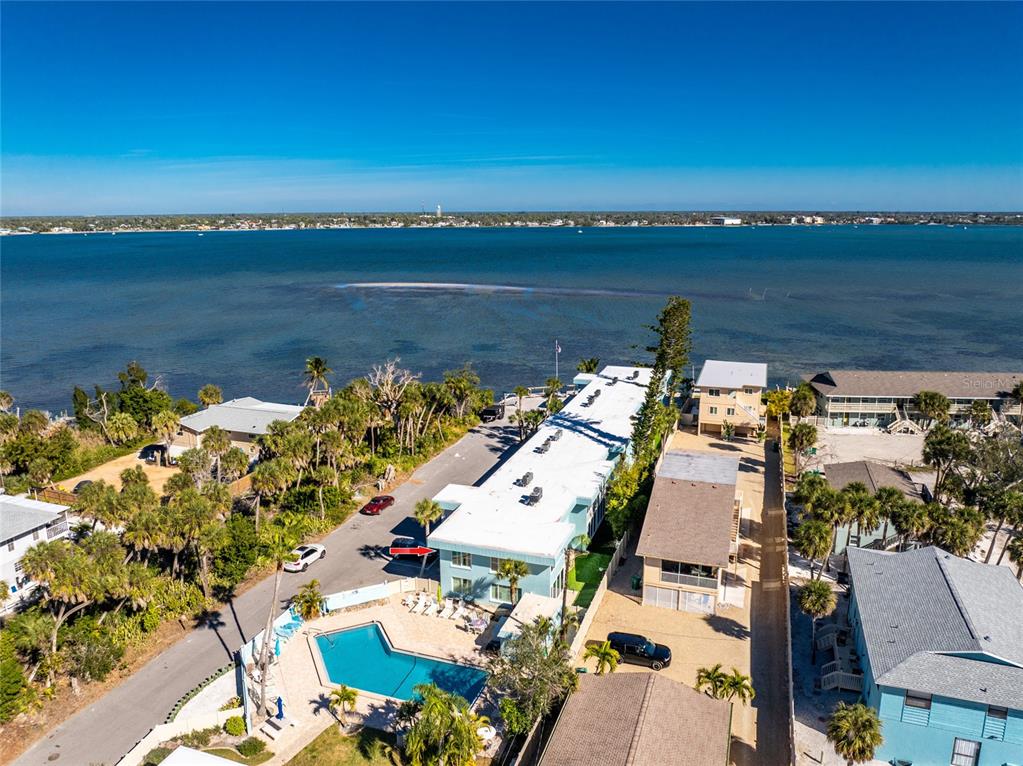5055 North Beach Road, Unit 208 Englewood, FL 34223 - Photo 43 of 43 an aerial view of a house with a ocean view