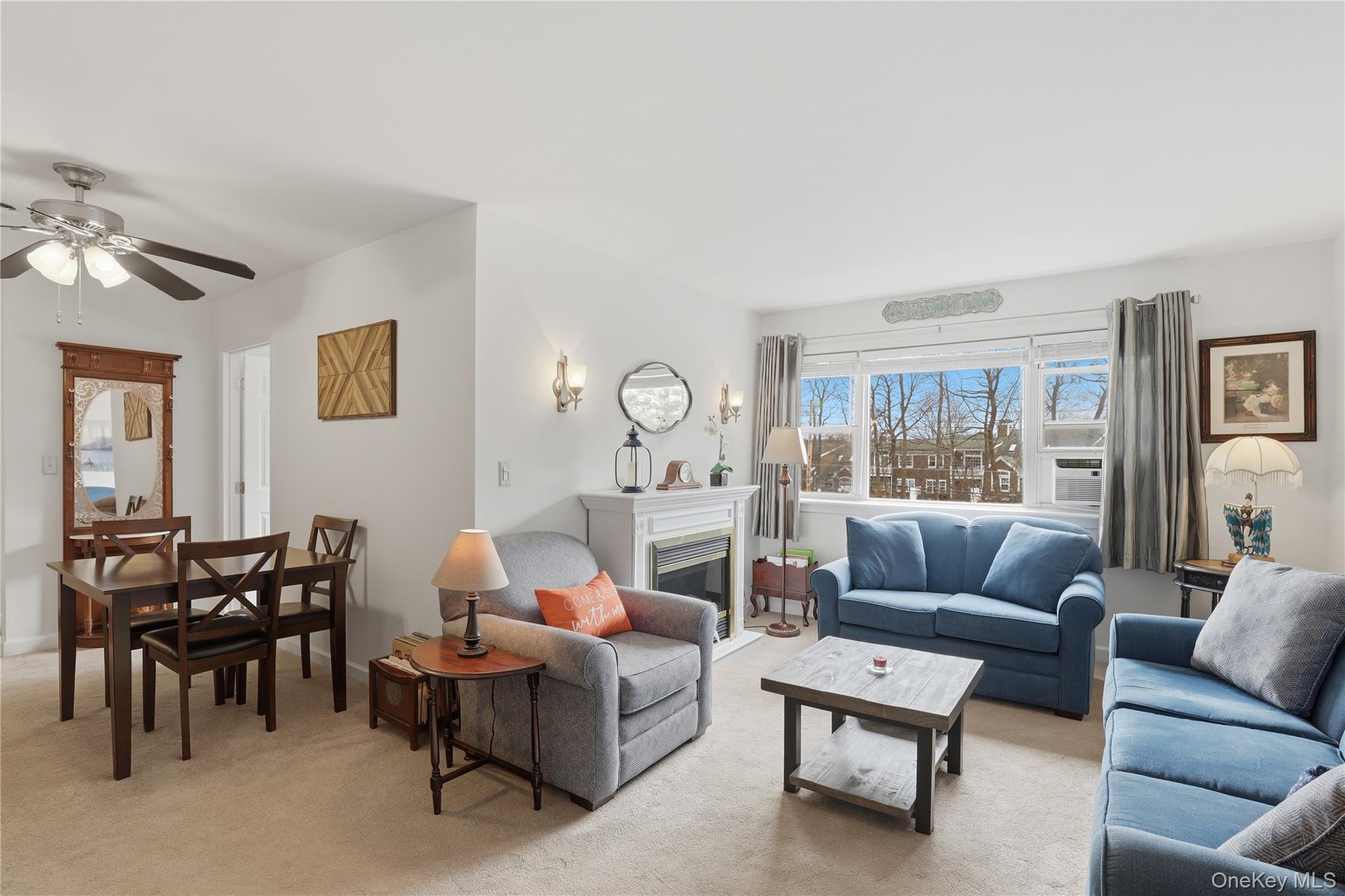 352 North State Road, Unit 1H Briarcliff Manor, NY 10510 - Photo 5 of 19 Living room and dining area.