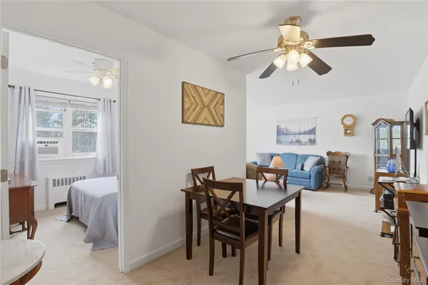 a view of a dining room with furniture