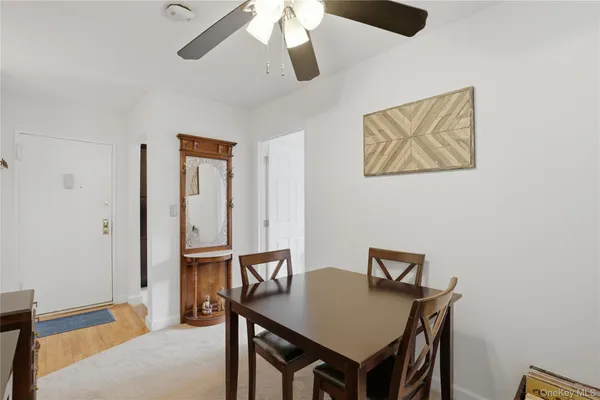 a view of a workspace with furniture