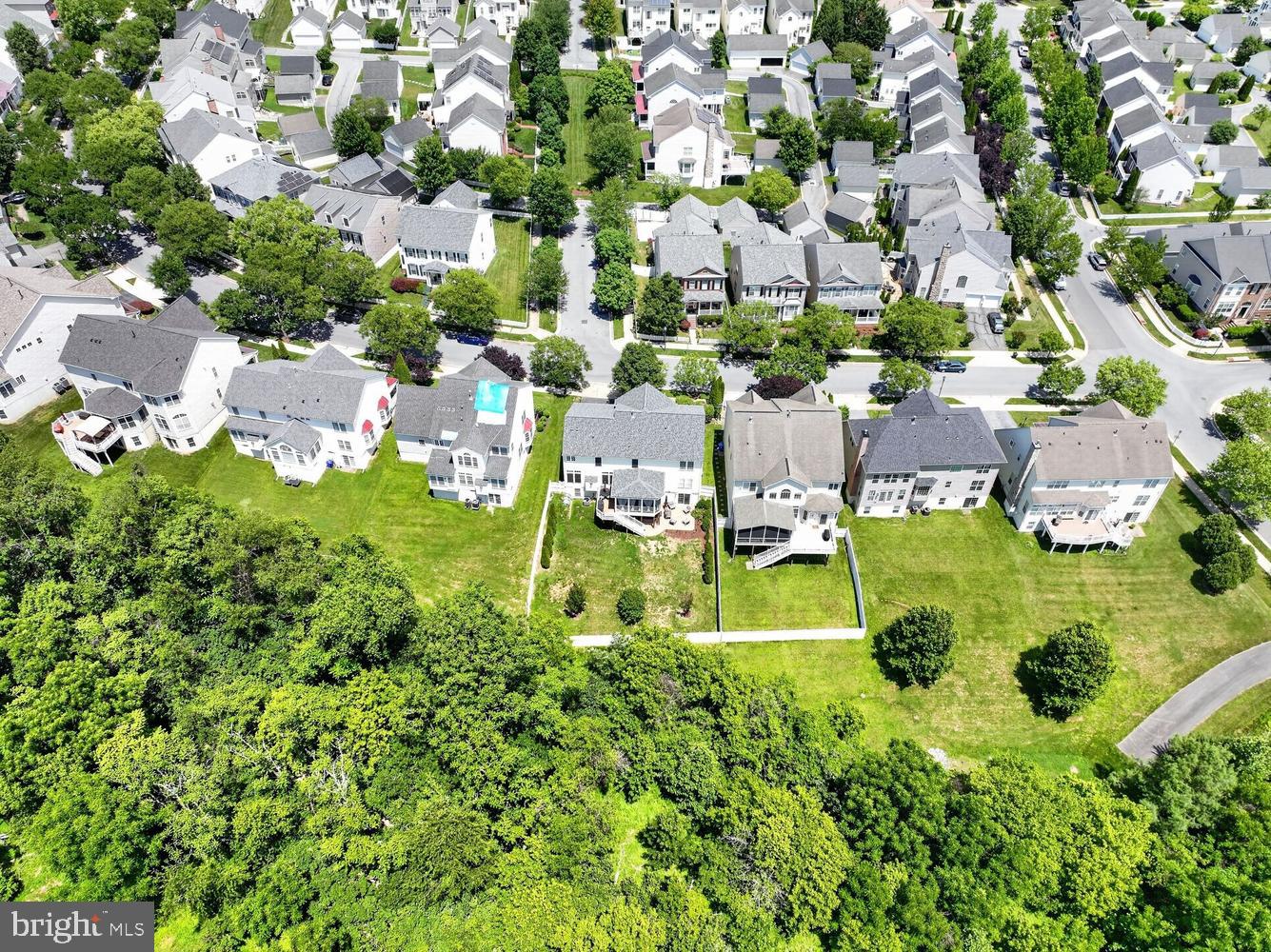23106 Birch Mead Road Clarksburg, MD 20871 - Photo 50 of 60 an aerial view of residential houses with outdoor space and trees all around