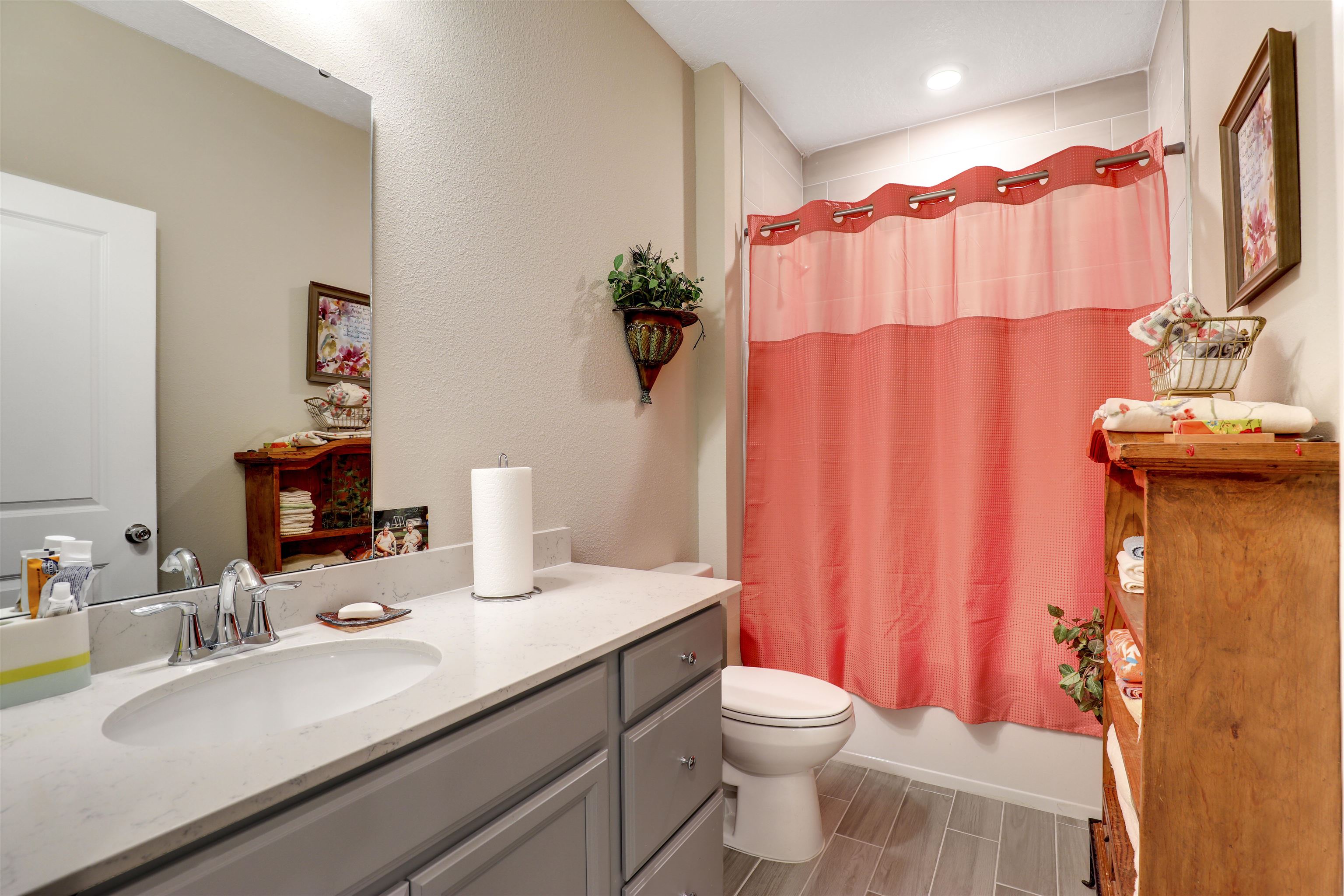 384 Gan Way St. Johns, FL 32259 - Photo 20 of 61 a bathroom with a sink a toilet and shower curtain