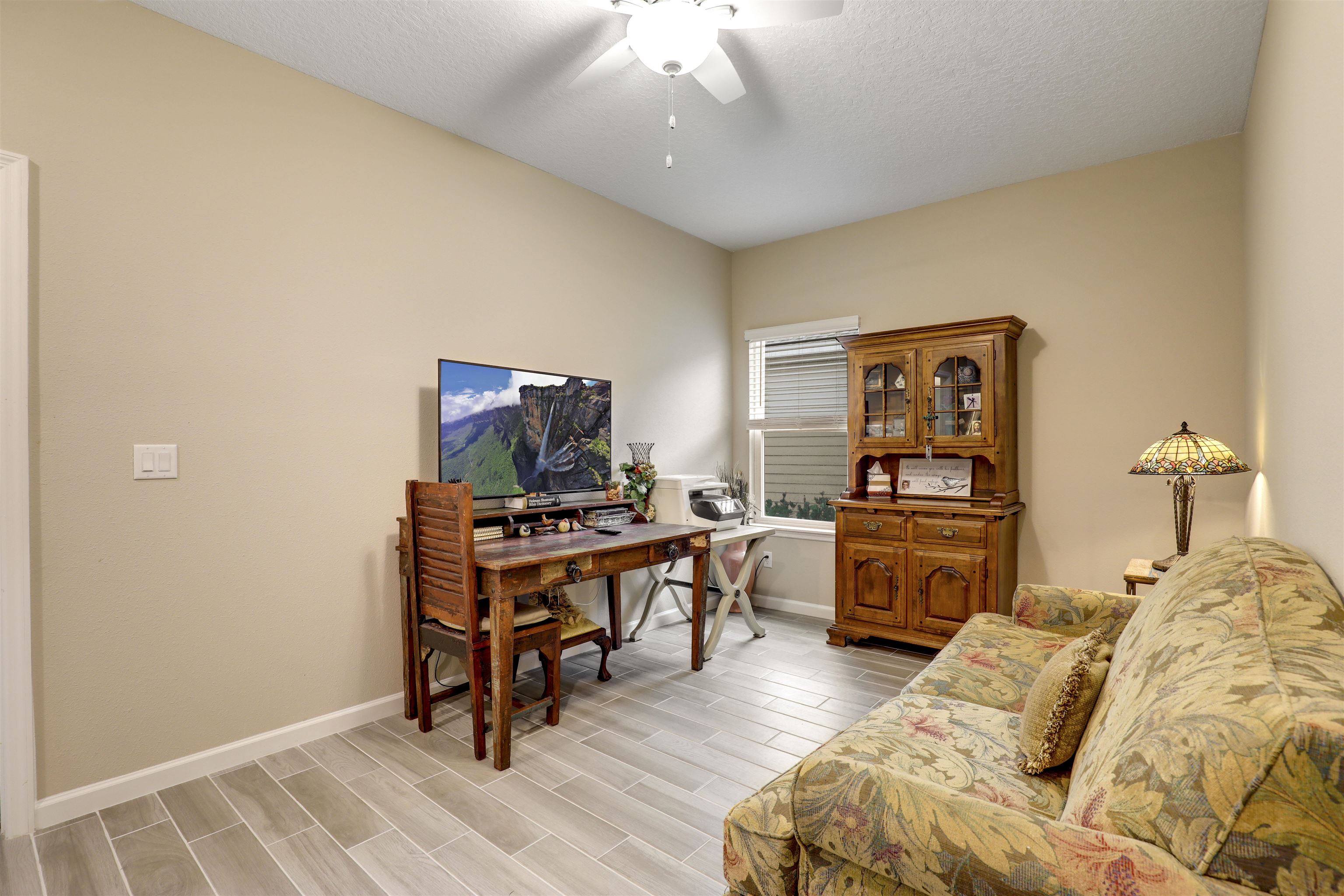 384 Gan Way St. Johns, FL 32259 - Photo 21 of 61 a bedroom with furniture and a flat screen tv
