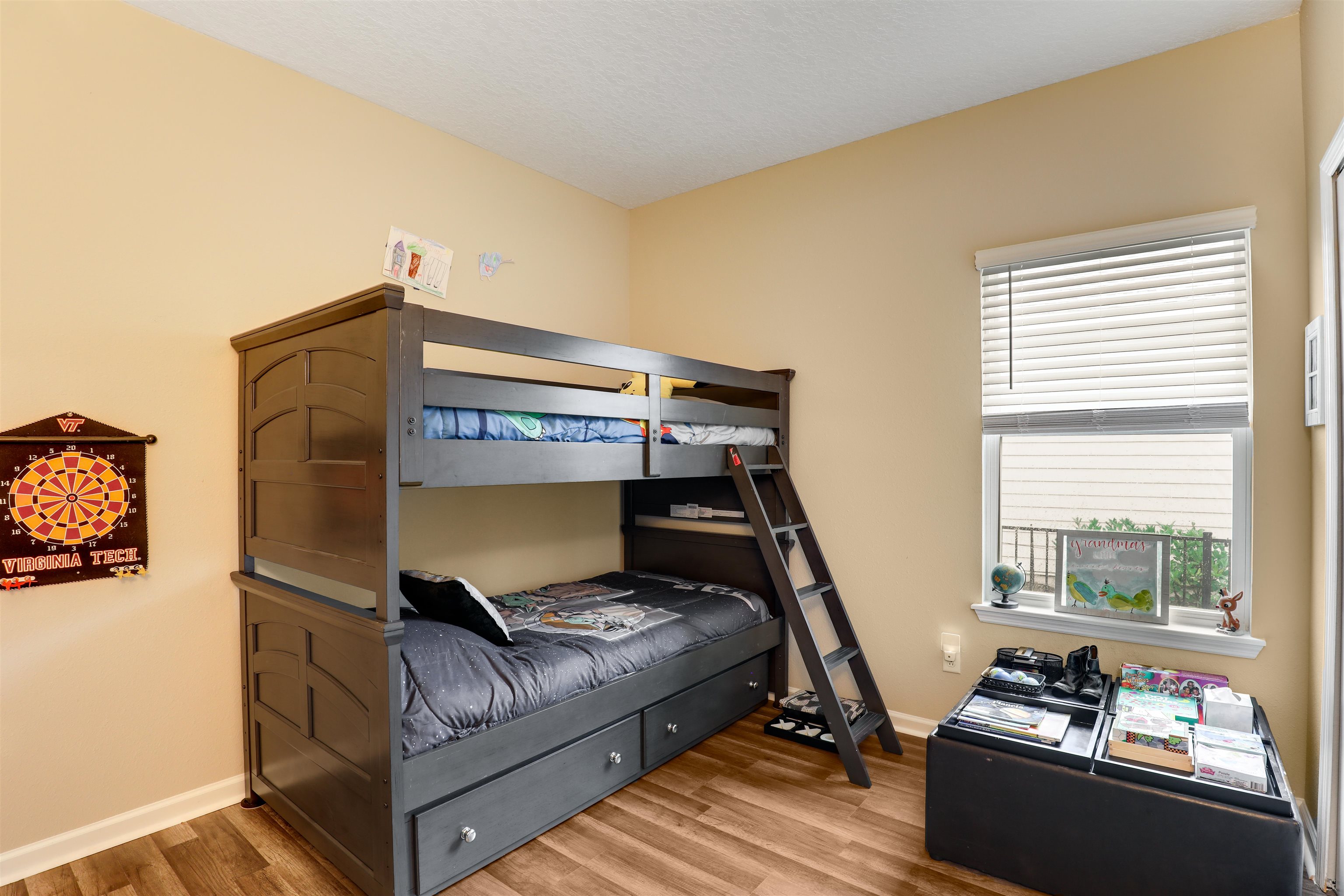 384 Gan Way St. Johns, FL 32259 - Photo 25 of 61 a bedroom with a bed and wooden floor