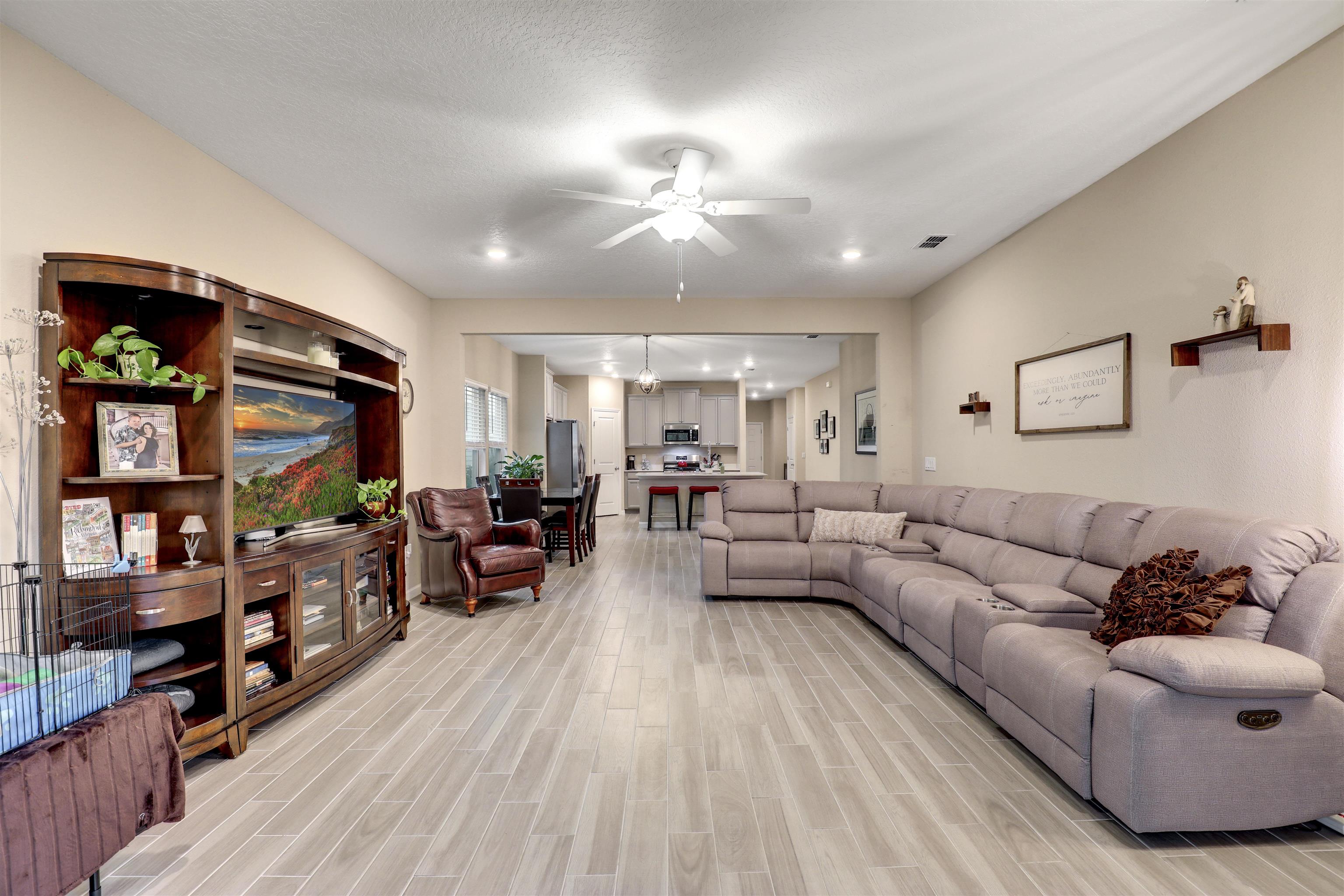 384 Gan Way St. Johns, FL 32259 - Photo 3 of 61 a living room with furniture and a flat screen tv