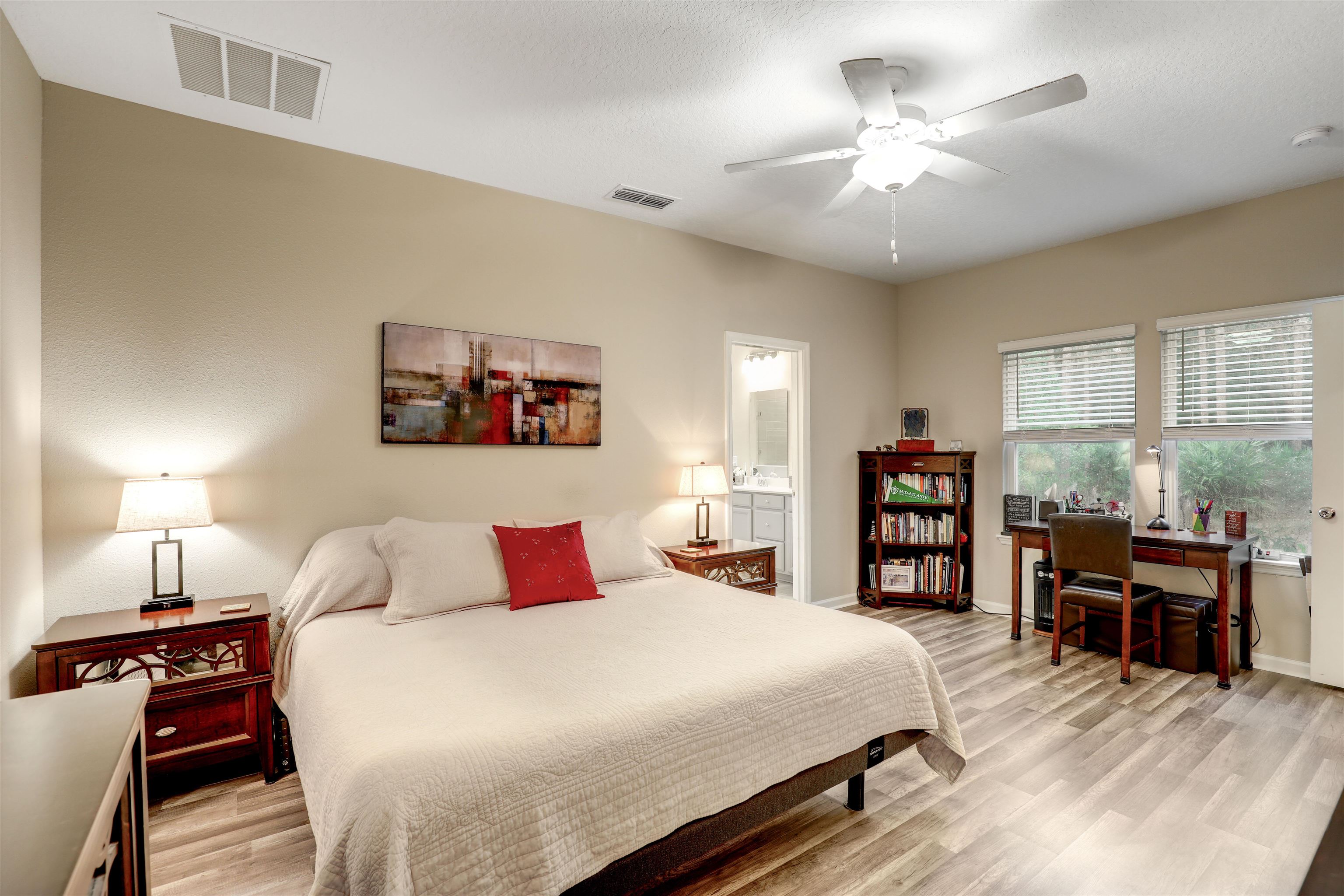 384 Gan Way St. Johns, FL 32259 - Photo 34 of 61 a bedroom with a bed and a chandelier