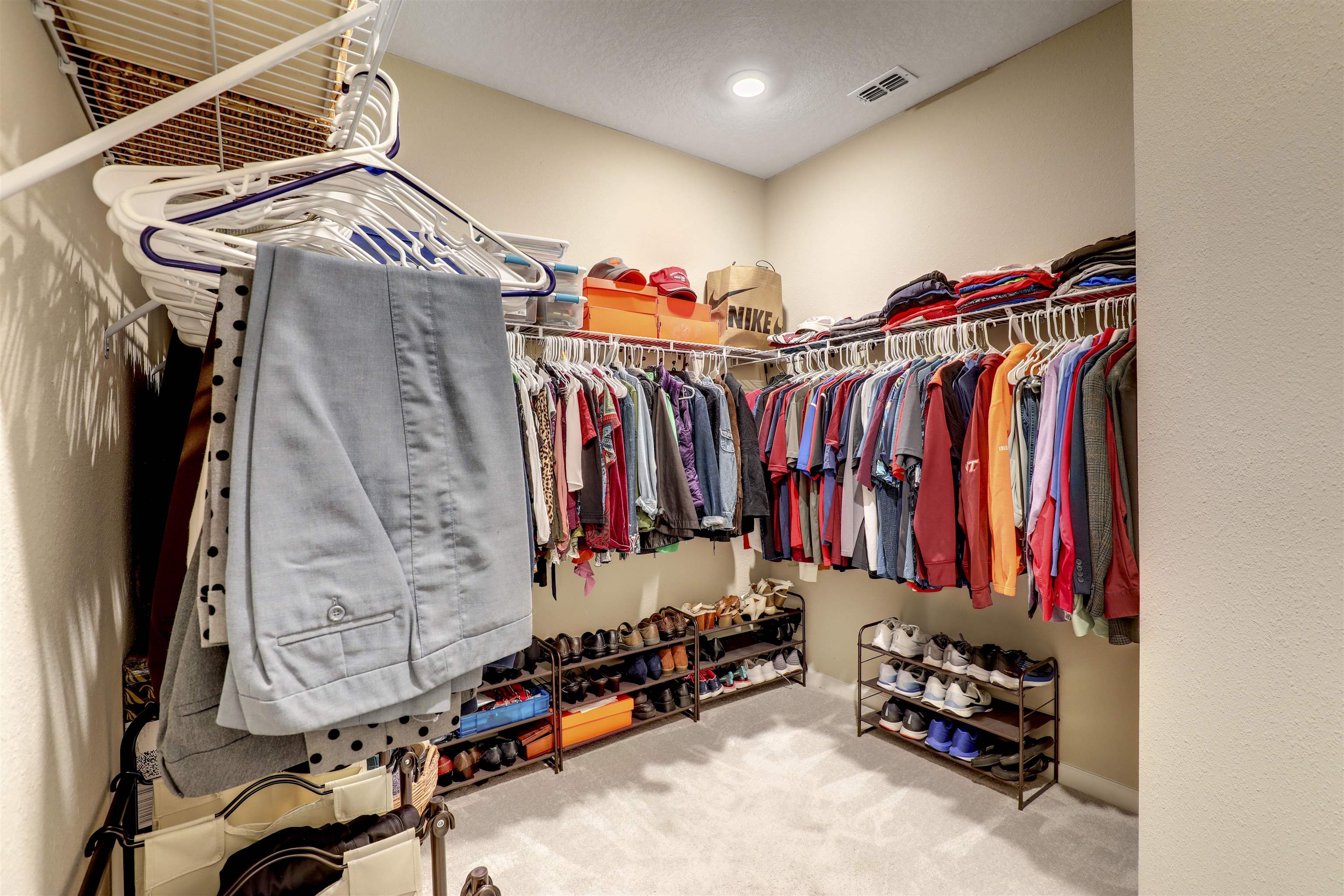 384 Gan Way St. Johns, FL 32259 - Photo 35 of 61 a view of walk in closet with clothes