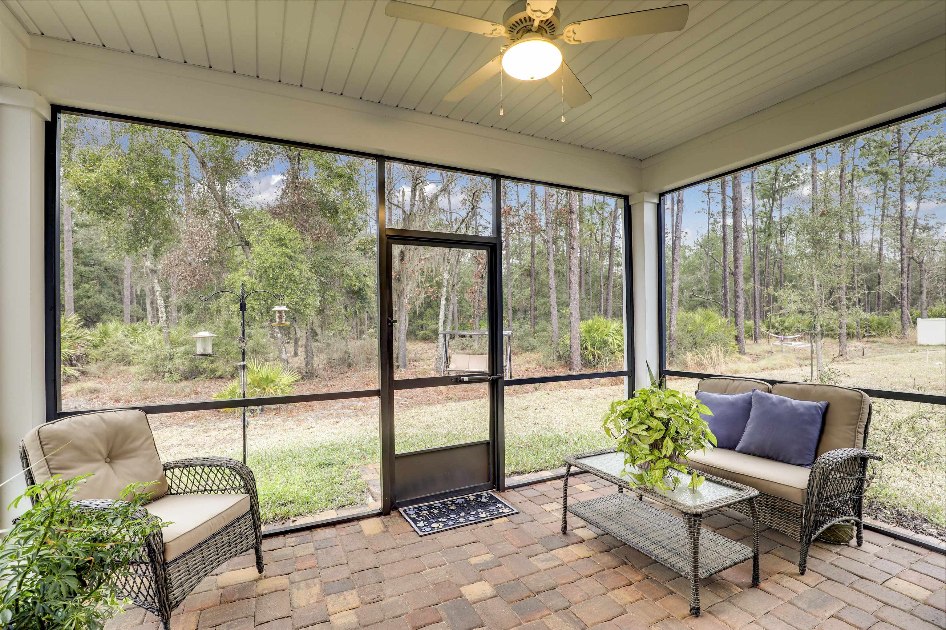 384 Gan Way St. Johns, FL 32259 - Photo 4 of 61 a living room filled with furniture and a large window