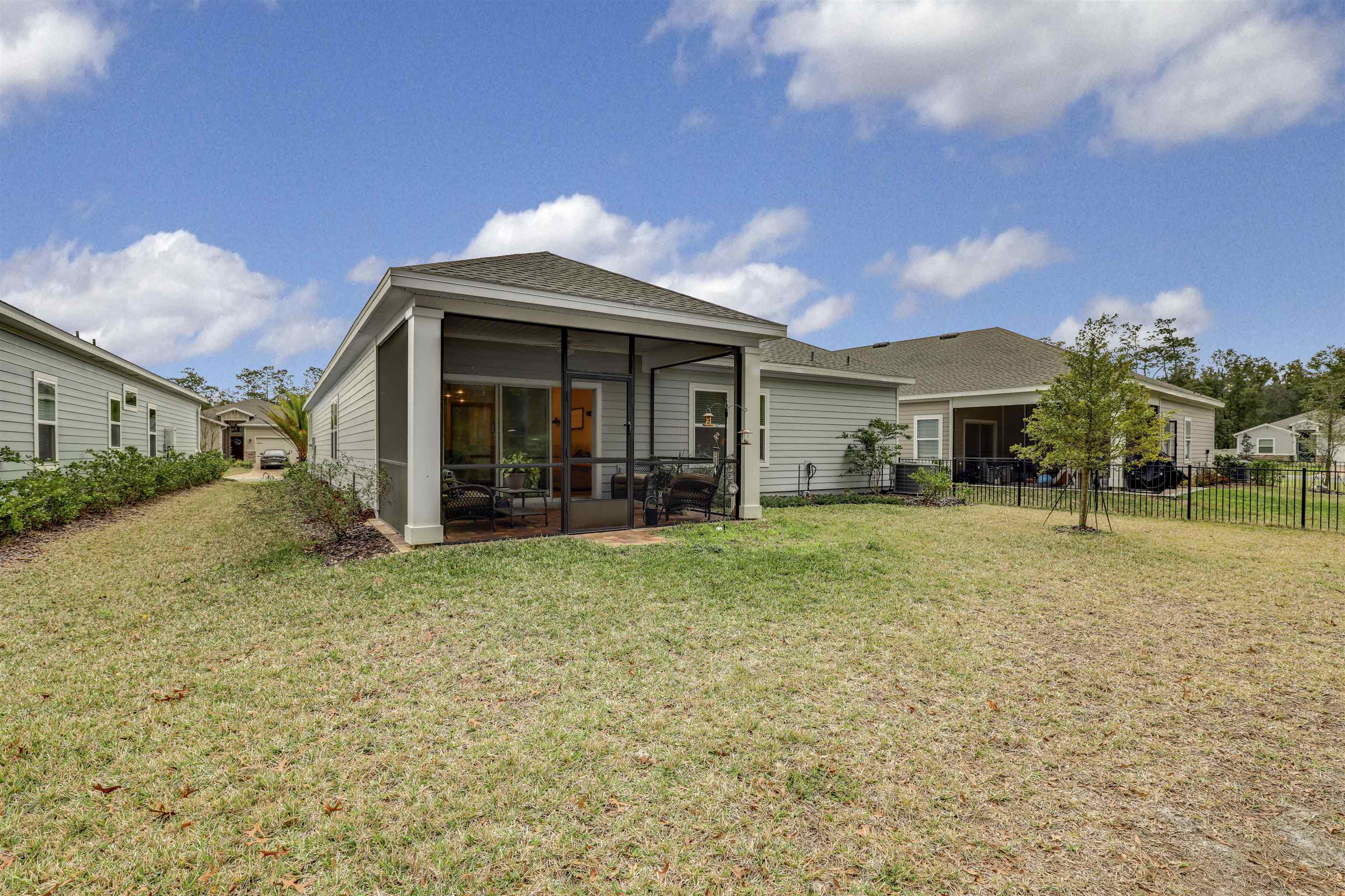 384 Gan Way St. Johns, FL 32259 - Photo 44 of 61 a view of a house with backyard and porch