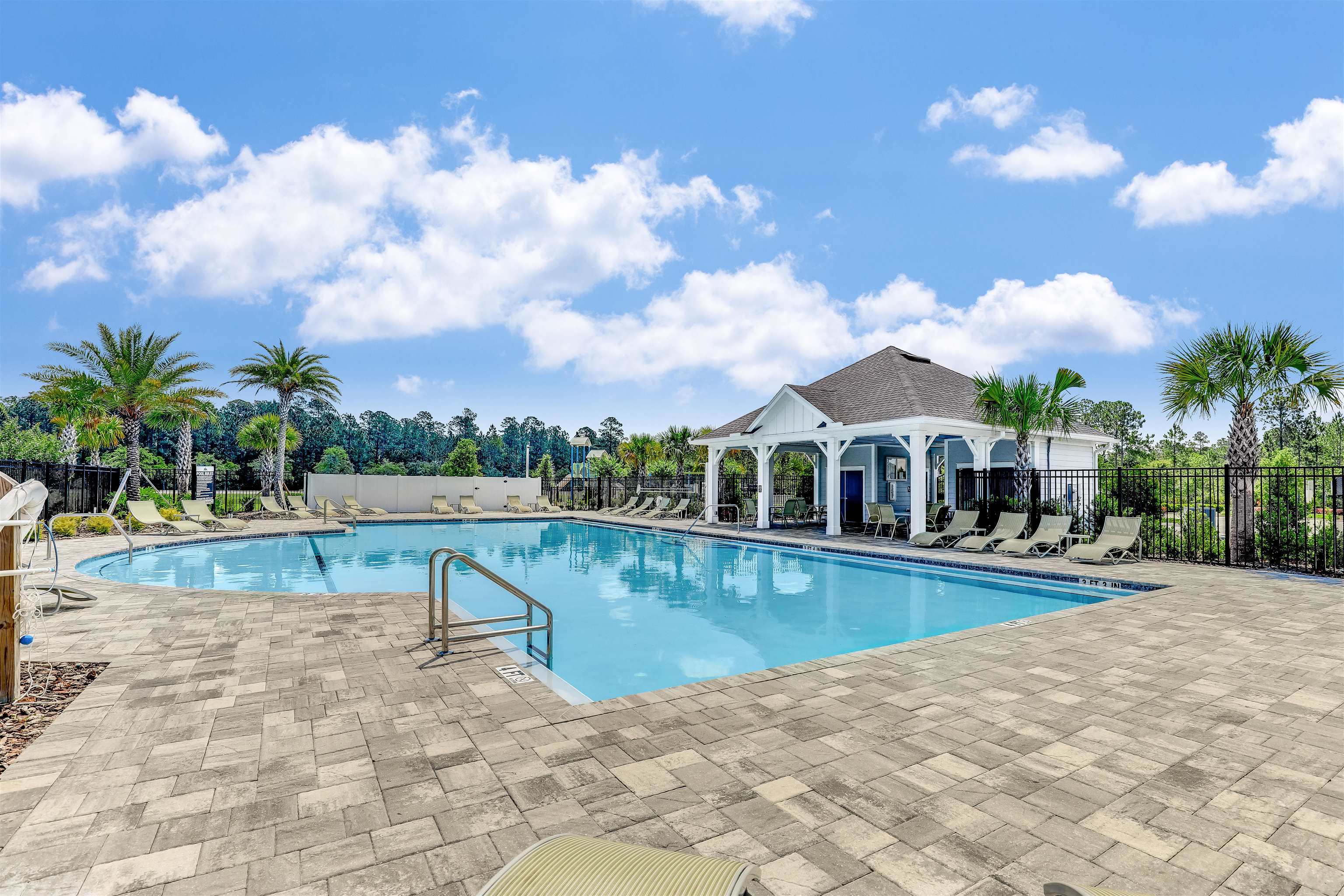 384 Gan Way St. Johns, FL 32259 - Photo 46 of 61 a view of a swimming pool with a patio