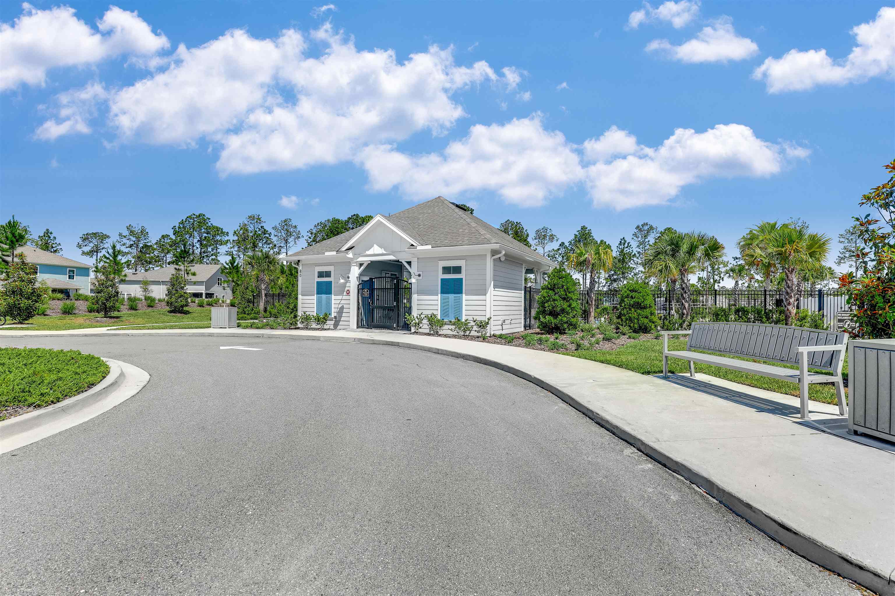 384 Gan Way St. Johns, FL 32259 - Photo 51 of 61 a view of a house with a big yard and a fountain