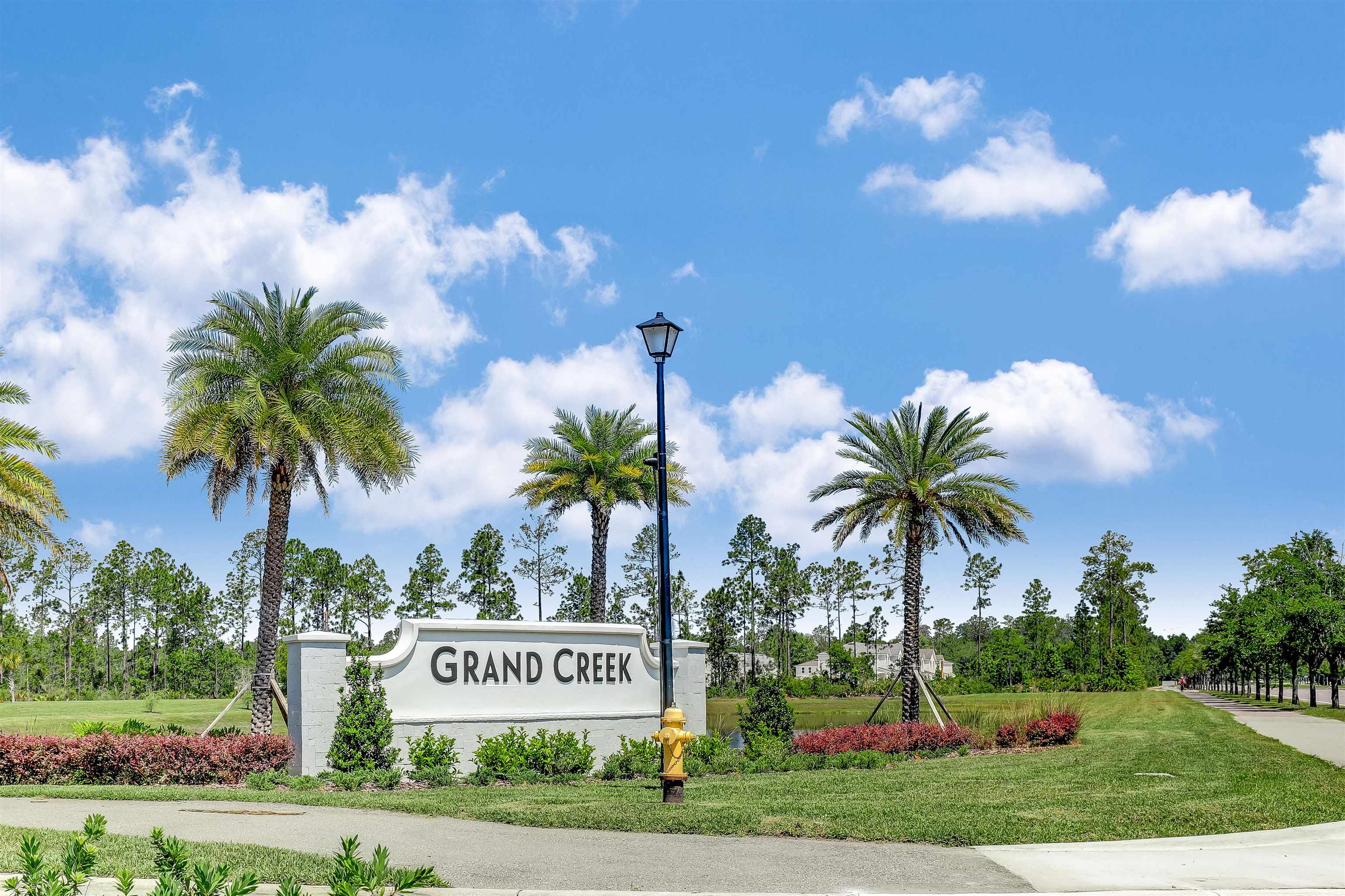 384 Gan Way St. Johns, FL 32259 - Photo 52 of 61 a sign on the side of the road