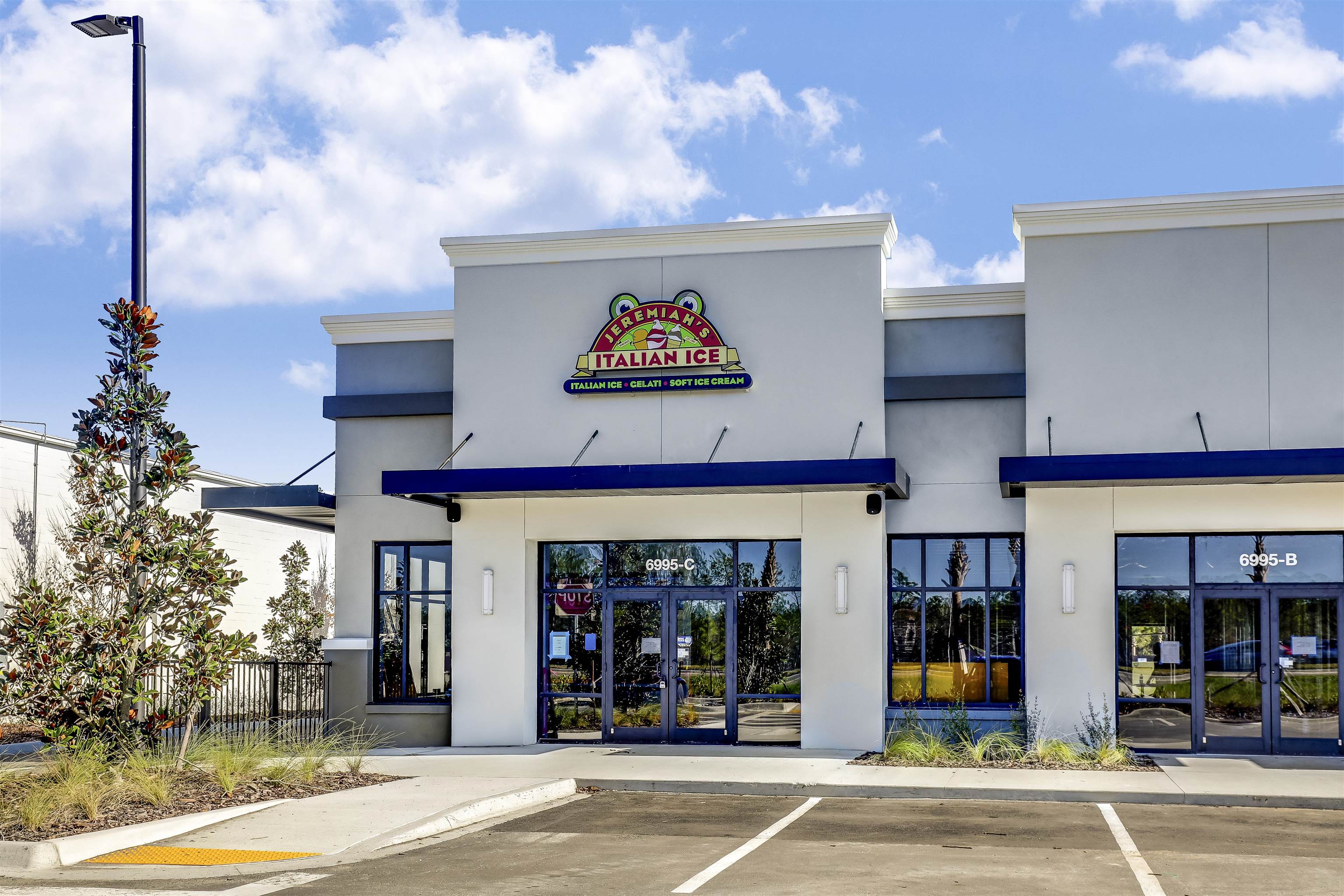 384 Gan Way St. Johns, FL 32259 - Photo 59 of 61 a view of a building with a window and refrigerator