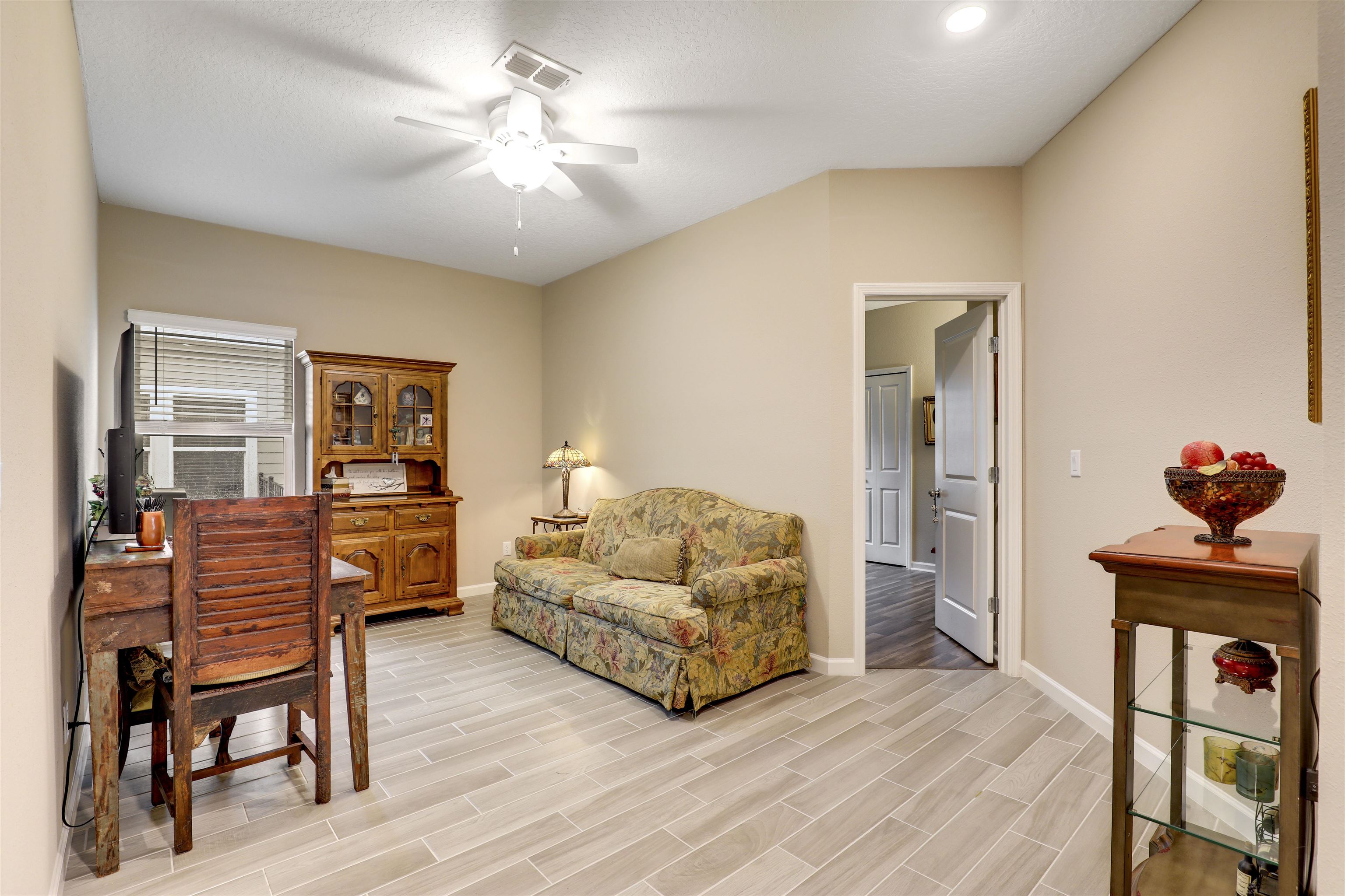 384 Gan Way St. Johns, FL 32259 - Photo 6 of 61 a living room with furniture and a chandelier
