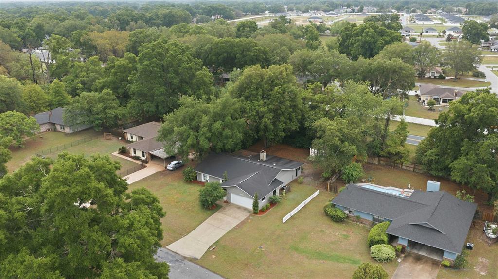 10500 Southwest 74th Court Ocala, FL 34476 - Photo 2 of 28 an aerial view of a house with a yard
