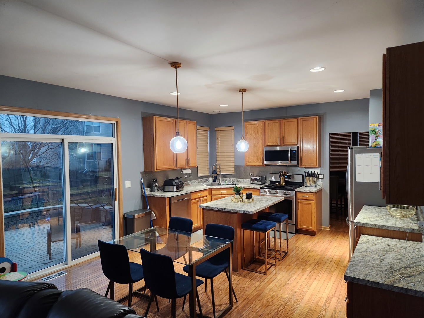 6509 Roth Drive Joliet, IL 60431 - Photo 5 of 10 a kitchen with a dining table and chairs