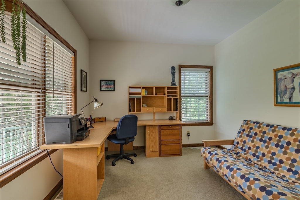 217 Cardinal Way Northampton, MA 01062 - Photo 24 of 37 a view of a workspace with furniture and a window