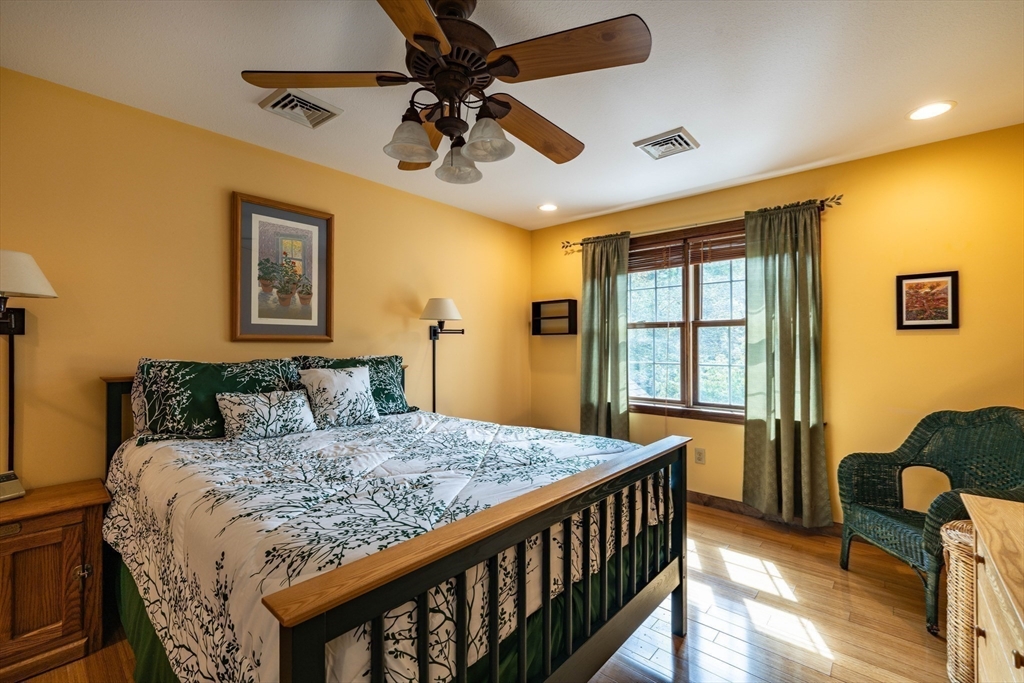 217 Cardinal Way Northampton, MA 01062 - Photo 28 of 37 a bedroom with a bed and a table