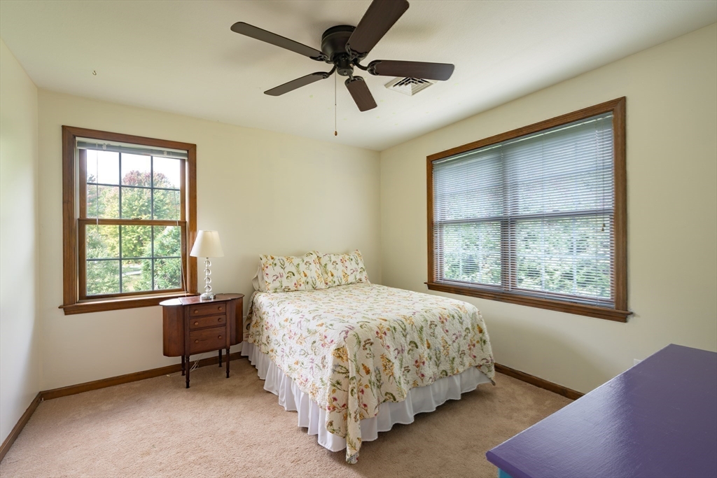 217 Cardinal Way Northampton, MA 01062 - Photo 30 of 37 a bedroom with a bed and a window