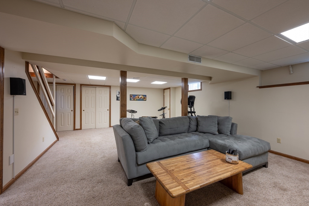 217 Cardinal Way Northampton, MA 01062 - Photo 37 of 37 a living room with furniture and a couch