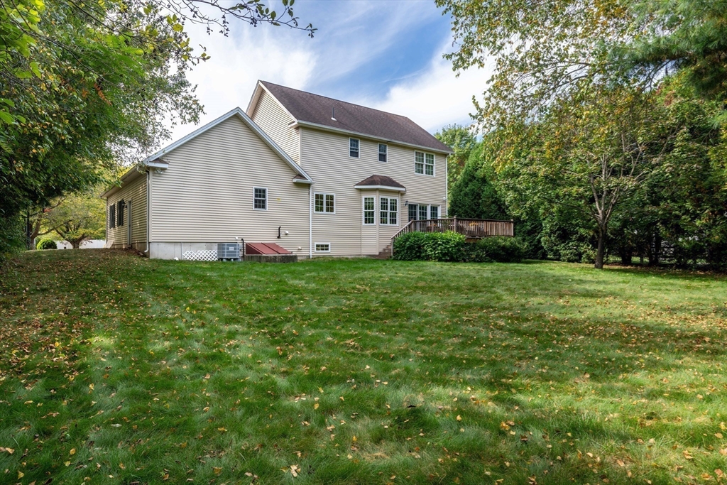 217 Cardinal Way Northampton, MA 01062 - Photo 8 of 37 a front view of house with yard and green space