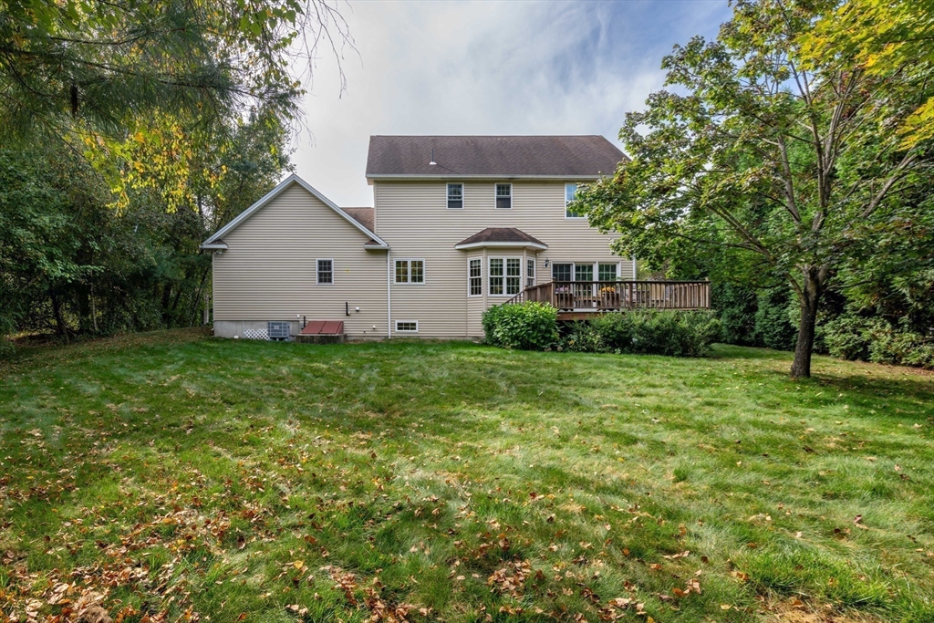 217 Cardinal Way Northampton, MA 01062 - Photo 9 of 37 a front view of a house with garden
