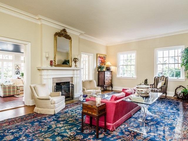 2025 Fairview Road Raleigh, NC 27608 - Photo 5 of 30 a living room with furniture and a fireplace