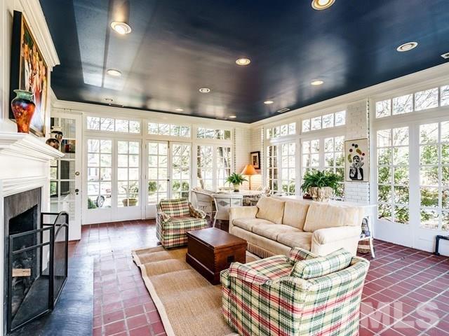 2025 Fairview Road Raleigh, NC 27608 - Photo 7 of 30 a living room with fireplace furniture and a large window