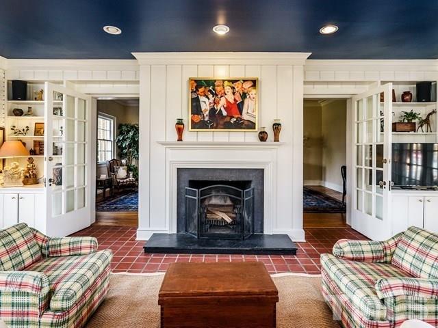 2025 Fairview Road Raleigh, NC 27608 - Photo 8 of 30 a living room with furniture and a fireplace