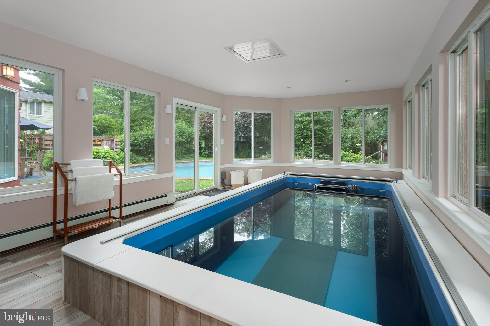 84 Cuyler Road Princeton, NJ 08540 - Photo 15 of 25 a view of swimming pool from a window