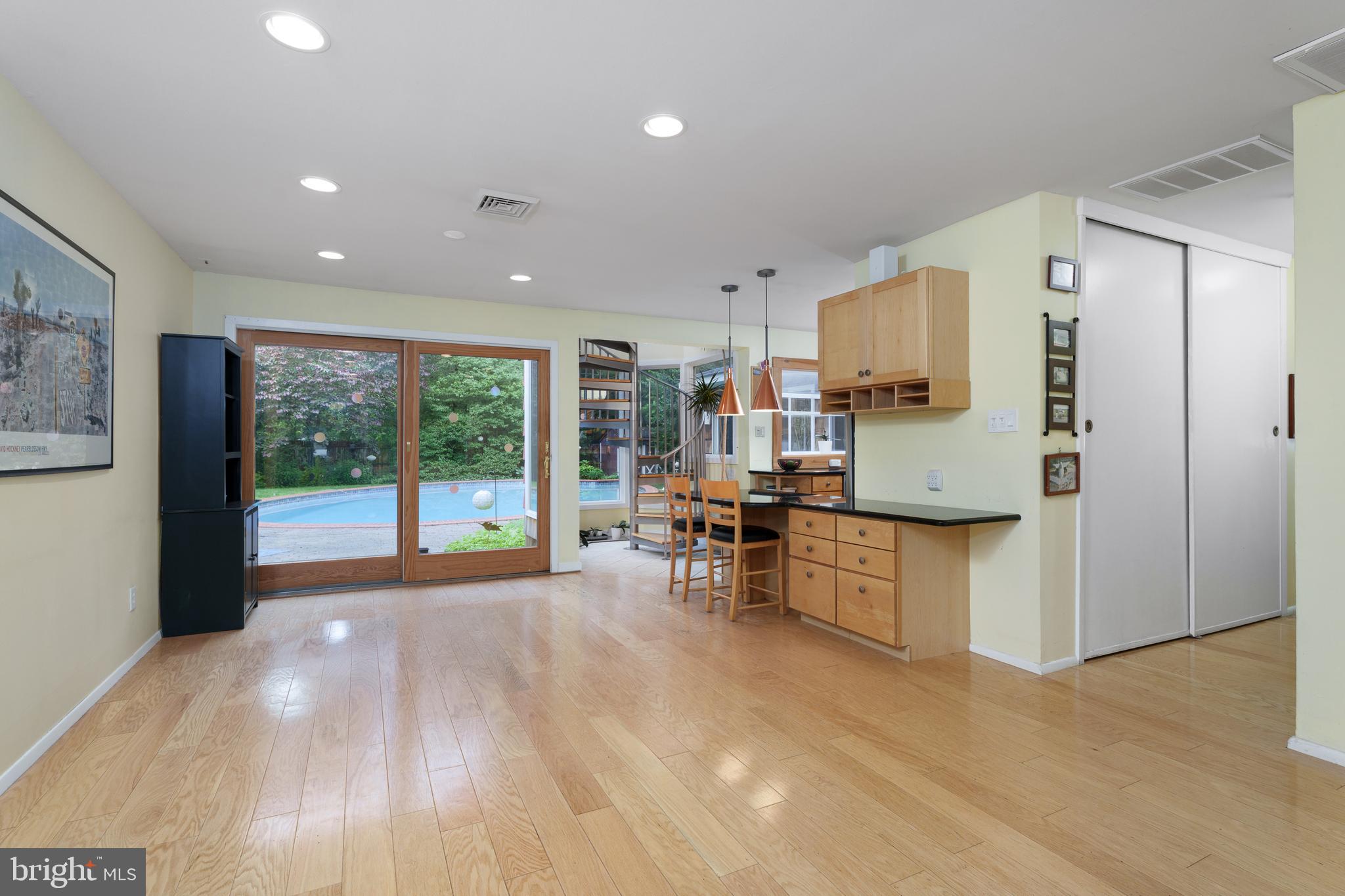 84 Cuyler Road Princeton, NJ 08540 - Photo 6 of 25 a kitchen with stainless steel appliances a refrigerator and wooden floor