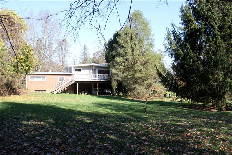 164 Oak Ridge Drive Butler, PA 16002 - Photo 3 of 25 Another unusual feature is bedroom 2 on the upper level which is large at 14x10 has a walkout man-door to an upper deck. The lower level walks out to a concrete patio and a huge, private back yard.
