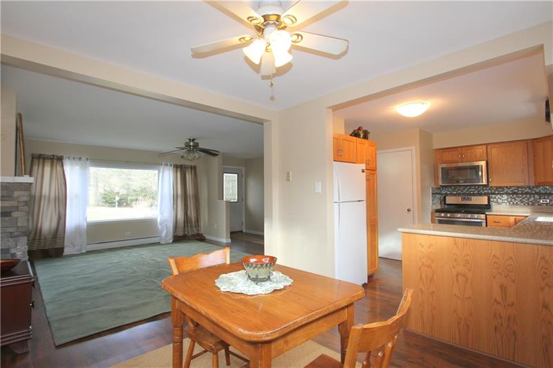164 Oak Ridge Drive Butler, PA 16002 - Photo 10 of 25 The 10'x10' Dining Room is open to the Kitchen and the Living Room.